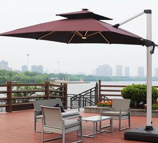 Outdoor parasol and furniture representing the safety protection line